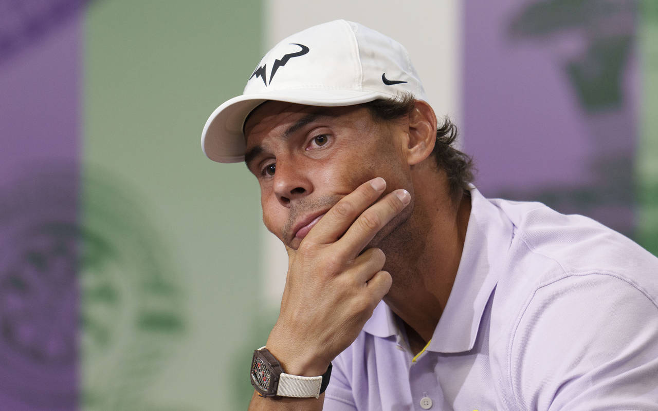 Spain's Rafael Nadal announces that he is withdrawing from the semi-final of the Gentlemen's Single...