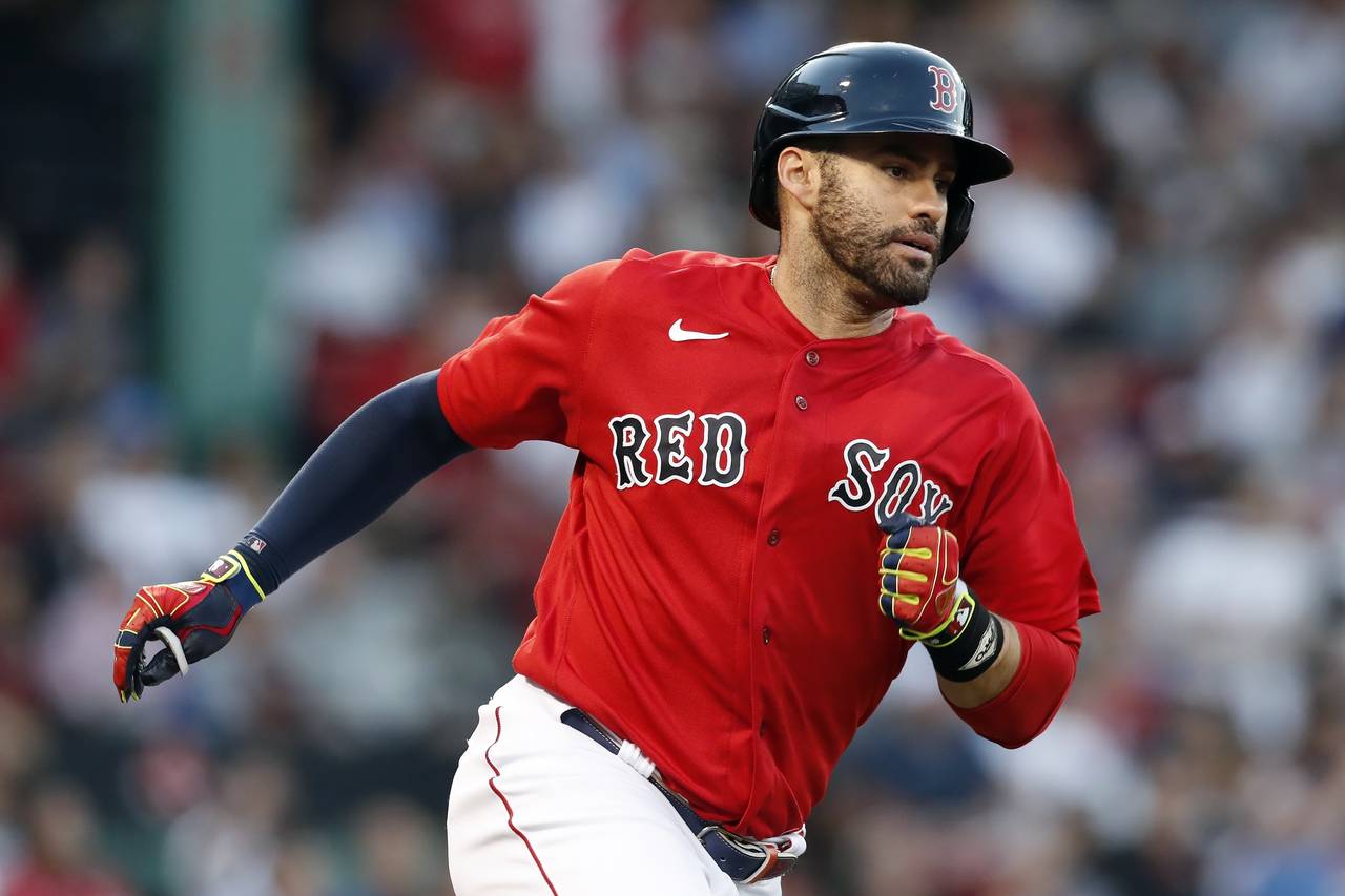 Boston Red Sox's J.D. Martinez runs on his solo home run during the third inning of a baseball game...