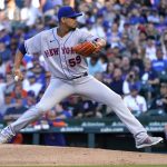 
              New York Mets starting pitcher Carlos Carrasco winds up during the first inning of the team's baseball game against the Chicago Cubs on Thursday, July 14, 2022, in Chicago. (AP Photo/Charles Rex Arbogast)
            
