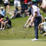 
              J.T. Poston putts on the ninth green during the final round of the John Deere Classic golf tournament, Sunday, July 3, 2022, at TPC Deere Run in Silvis, Ill. (AP Photo/Charlie Neibergall)
            