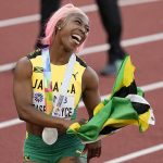 
              Silver medalist Shelly-Ann Fraser-Pryce, of Jamaica celebrates after the final of the women's 200-meter run at the World Athletics Championships on Thursday, July 21, 2022, in Eugene, Ore. (AP Photo/Gregory Bull)
            