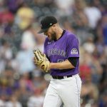 
              Colorado Rockies relief pitcher Daniel Bard reacts after striking out Pittsburgh Pirates' Josh VanMeter during the ninth inning of a baseball game Saturday, July 16, 2022, in Denver. (AP Photo/David Zalubowski)
            