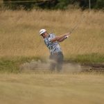
              Cameron Smith, of Australia, plays out of a bunker on the 13th hole during the third round of the British Open golf championship on the Old Course at St. Andrews, Scotland, Saturday July 16, 2022. (AP Photo/Gerald Herbert)
            