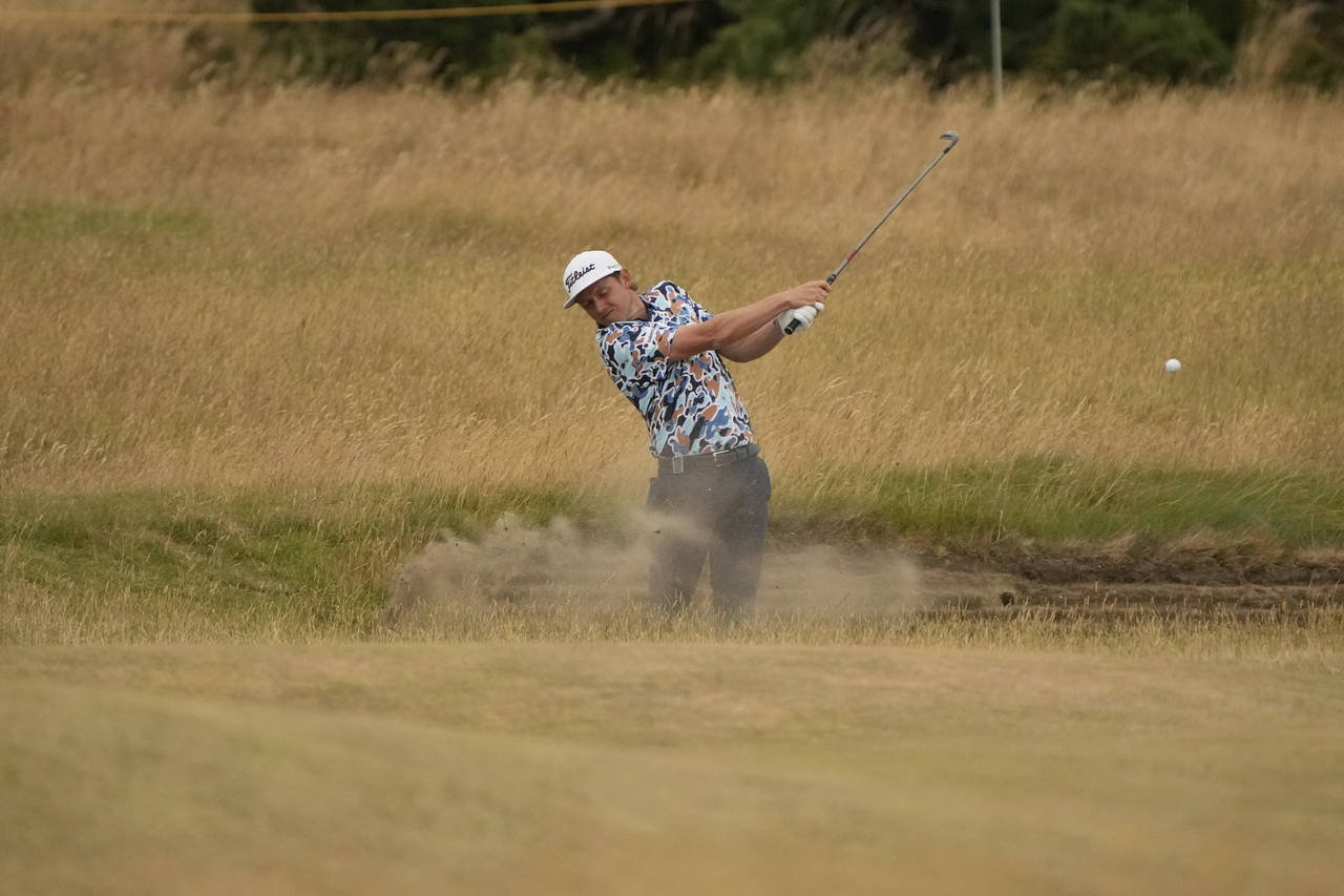 Cameron Smith, of Australia, plays out of a bunker on the 13th hole during the third round of the B...