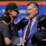 
              New York Mets announcer and former player Keith Hernandez, right, greets Miami Marlins manager Don Mattingly, left, after a pre-game ceremony to retire his player number before a baseball game between the Mets and Marlins, Saturday, July 9, 2022, in New York. (AP Photo/John Minchillo)
            