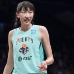 
              FILE - New York Liberty center Han Xu is shown during the first half of a WNBA exhibition basketball game against China, Thursday, May 9, 2019, in New York. Standing 6-10, Han would like to emulate Yao Ming's impact — including his influence on the sport in China. She wants to be a female beacon of basketball in her native land. (AP Photo/Mary Altaffer, File)
            