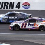 
              Denny Hamlin (11) chases Brad Keselowski (6) through Turn 4 during a NASCAR Cup Series auto race at the New Hampshire Motor Speedway, Sunday, July 17, 2022, in Loudon, N.H. (AP Photo/Charles Krupa)
            