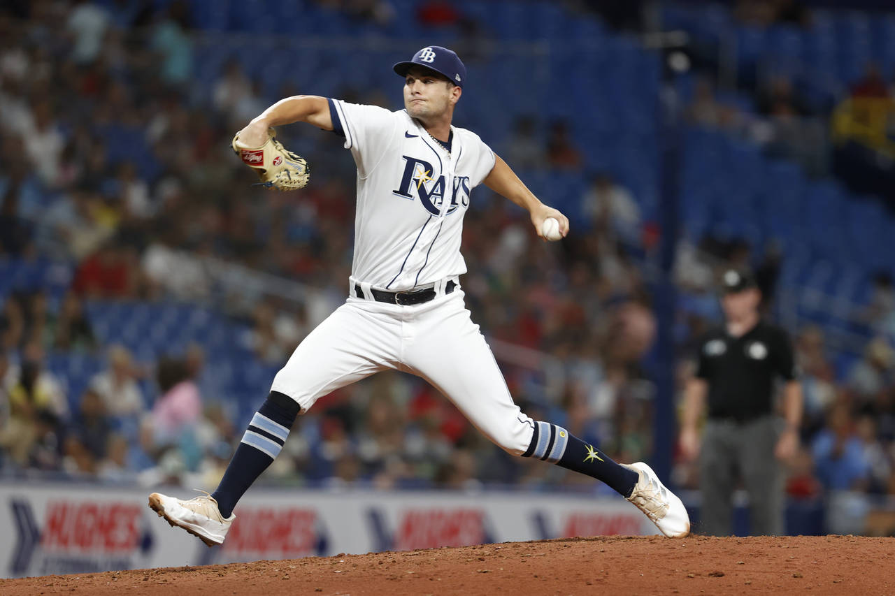 Tampa Bay Rays starting pitcher Shane McClanahan throws to a Boston Red Sox batter during the sixth...