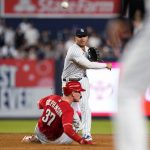 
              New York Yankees' Gleyber Torres throws out Cincinnati Reds' Kyle Farmer at first base after forcing out Tyler Stephenson (37) for a double play during the 10th inning of a baseball game Wednesday, July 13, 2022, in New York. The Yankees won 7-6. (AP Photo/Frank Franklin II)
            