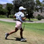 
              Miroku Suto of Japan runs to her cart on the fifth hole during the final round of the Junior World Championships golf tournament at Singing Hills Golf Resort on Thursday, July 14, 2022, in El Cajon, Calif. (AP Photo/Denis Poroy)
            