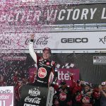 
              Christopher Bell celebrates after winning a NASCAR Cup Series auto race at the New Hampshire Motor Speedway, Sunday, July 17, 2022, in Loudon, N.H. (AP Photo/Charles Krupa)
            