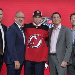 
              Simon Nemec poses for photos after being selected by the New Jersey Devils with the second pick in the first round of the NHL hockey draft Thursday, July 7, 2022, in Montreal. (Ryan Remiorz/The Canadian Press via AP)
            