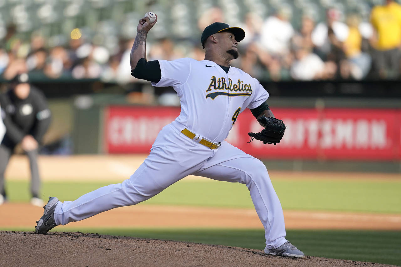 Oakland Athletics' Frankie Montas pitches against the Houston Astros during the first inning of a b...