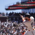 
              San Francisco Giants' Brandon Belt breaks his bat hitting an RBI single during the second inning of a baseball game against the Milwaukee Brewers in San Francisco, Sunday, July 17, 2022. (AP Photo/Jeff Chiu)
            