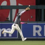 
              Washington Nationals right fielder Juan Soto (22) catcches a fly ball by St. Louis Cardinals' Paul Goldschmidt during the fourth inning of a baseball game, Saturday, July 30, 2022, in Washington. (AP Photo/Nick Wass)
            