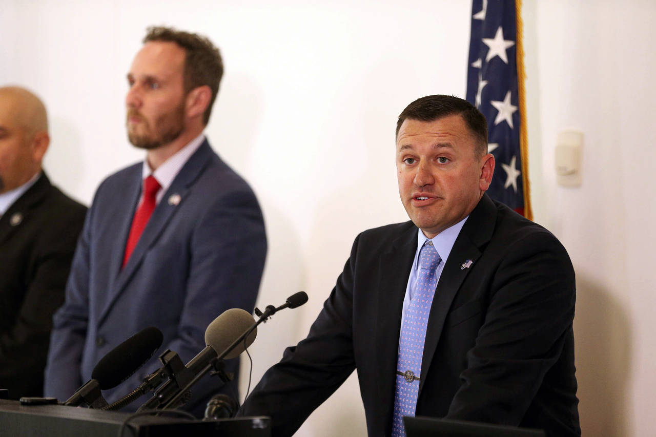 Brandon Filla, Deputy United States Marshal, speaks at a press conference at the United States Fede...