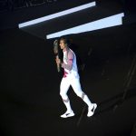 
              England's Kim Daybell carries the baton during the opening ceremony of the Commonwealth Games at the Alexander Stadium in Birmingham, England, Thursday July 28, 2022. (Zac Goodwin/PA via AP)
            