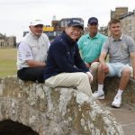 
              Scotland's Paul Lawrie, Tom Watson of the US, Stewart Cink and Kipp Popert, from left, pose for a photo on the Swilken bridge during a 'Champions round' as preparations continue for the British Open golf championship on the Old Course at St. Andrews, Scotland, Monday July 11, 2022. The Open Championship returns to the home of golf on July 14-17, 2022, to celebrate the 150th edition of the sport's oldest championship, which dates to 1860 and was first played at St. Andrews in 1873. (AP Photo/Peter Morrison)
            