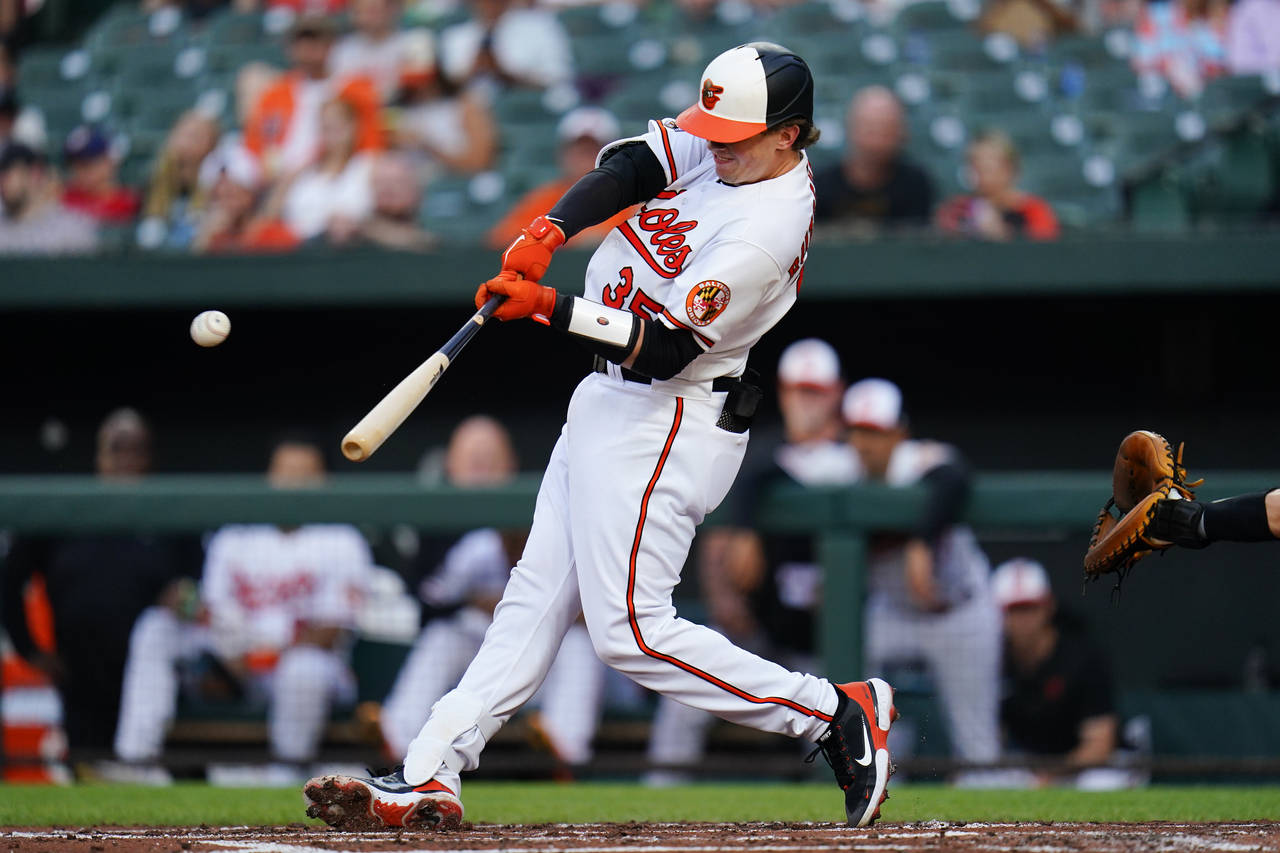 Baltimore Orioles' Adley Rutschman hits a solo home run off Los Angeles Angels starting pitcher Cha...