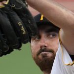 
              Pittsburgh Pirates starting pitcher Zach Thompson winds up during the first inning of the team's baseball game against the Philadelphia Phillies in Pittsburgh, Thursday, July 28, 2022. (AP Photo/Gene J. Puskar)
            