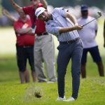 
              Cameron Young hits off the seventh fairway during the final round of the Rocket Mortgage Classic golf tournament, Sunday, July 31, 2022, in Detroit. (AP Photo/Carlos Osorio)
            