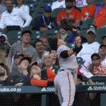 
              Baltimore Orioles first baseman Ryan Mountcastle catches a popup by Chicago Cubs' Willson Contreras in front of the Baltimore dugout during the first inning of a baseball game Wednesday, July 13, 2022, in Chicago. (AP Photo/Charles Rex Arbogast)
            