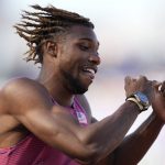 
              Noah Lyles, of the United States, wins a heat in the men's 200-meter run at the World Athletics Championships on Monday, July 18, 2022, in Eugene, Ore. (AP Photo/Ashley Landis)
            