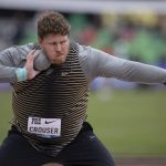 
              FILE - The United States' Ryan Crouser competes in the men's shot put during the Prefontaine Classic track and field meet at Hayward Field Saturday, May 28, 2022, in Eugene, Ore. Among those who might break their own world records are hurdlers Sydney McLaughlin and Karsten Warholm and shot putter Ryan Crouser. Jamaican speedster Elaine Thompson-Herah could make a run at 100-meter record that Florence Griffith-Joyner has held since 1988. (AP Photo/Amanda Loman, File)
            