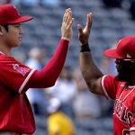 
              Los Angeles Angels' Shohei Ohtani, left, and Luis Rengifo celebrate after their baseball game against the Kansas City Royals Wednesday, July 27, 2022, in Kansas City, Mo. The Angels won 4-0. (AP Photo/Charlie Riedel)
            