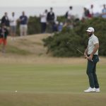 
              Dustin Johnson of the US after missing a putt on the 12th green during the third round of the British Open golf championship on the Old Course at St. Andrews, Scotland, Saturday July 16, 2022. (AP Photo/Alastair Grant)
            