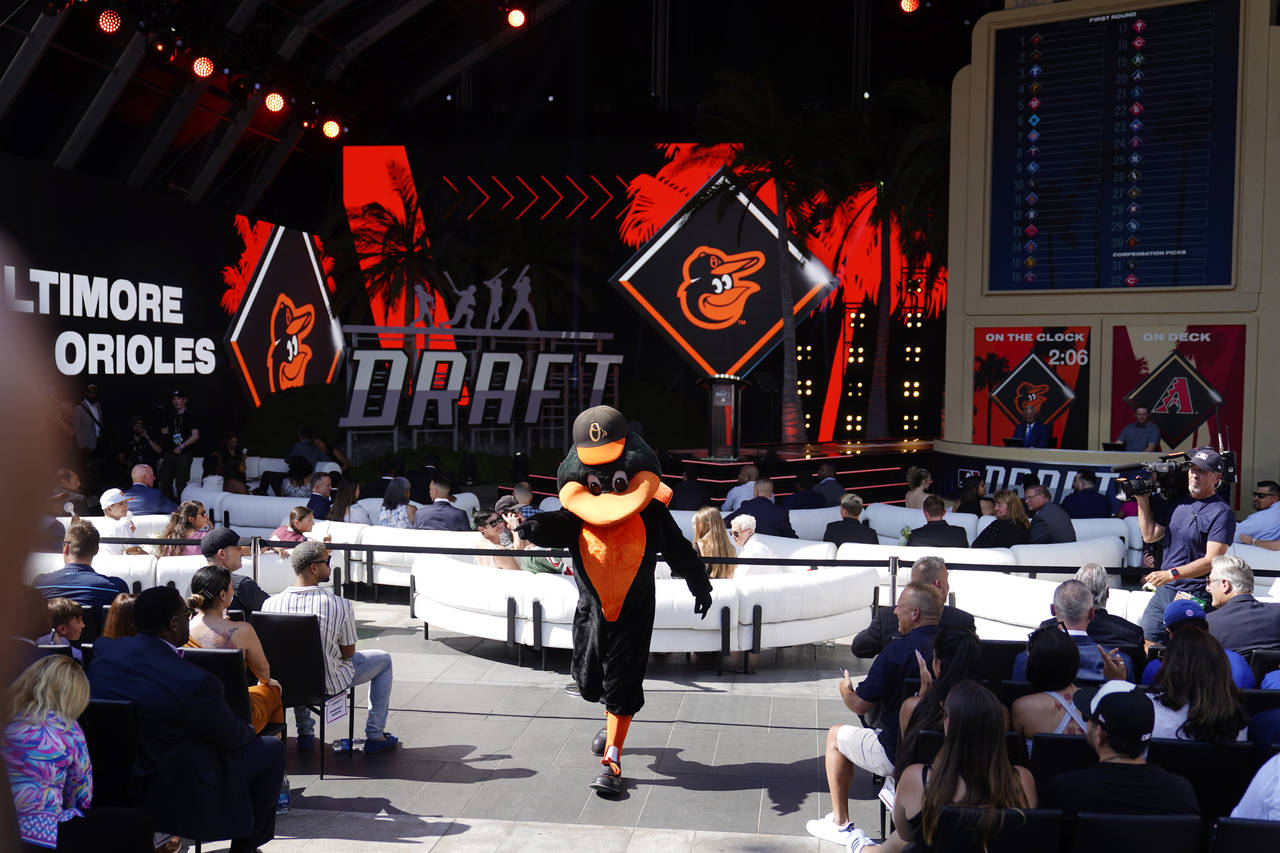 The Baltimore Orioles mascot greets fans during the 2022 MLB baseball draft, Sunday, July 17, 2022,...