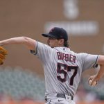 
              Cleveland Guardians starting pitcher Shane Bieber throws during the second inning of a baseball game against the Detroit Tigers, Wednesday, July 6, 2022, in Detroit. (AP Photo/Carlos Osorio)
            