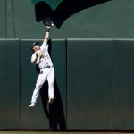 
              Oakland Athletics center fielder Skye Bolt misses a deep fly ball to allow a solo home run for Houston Astros' Kyle Tucker during the eighth inning of a baseball game in Oakland, Calif., Sunday, July 10, 2022. (AP Photo/John Hefti)
            