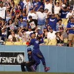 
              Los Angeles Dodgers right fielder Mookie Betts makes a catch on a ball hit by San Francisco Giants' Wilmer Flores during the sixth inning of a baseball game Saturday, July 23, 2022, in Los Angeles. (AP Photo/Mark J. Terrill)
            