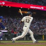 
              San Francisco Giants' Austin Slater watches his RBI double against the Chicago Cubs during the fourth inning of a baseball game in San Francisco, Thursday, July 28, 2022. (AP Photo/Godofredo A. Vásquez)
            