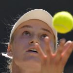 
              Kazakhstan's Elena Rybakina serves to Tunisia's Ons Jabeur in the final of the women's singles on day thirteen of the Wimbledon tennis championships in London, Saturday, July 9, 2022. (AP Photo/Kirsty Wigglesworth)
            
