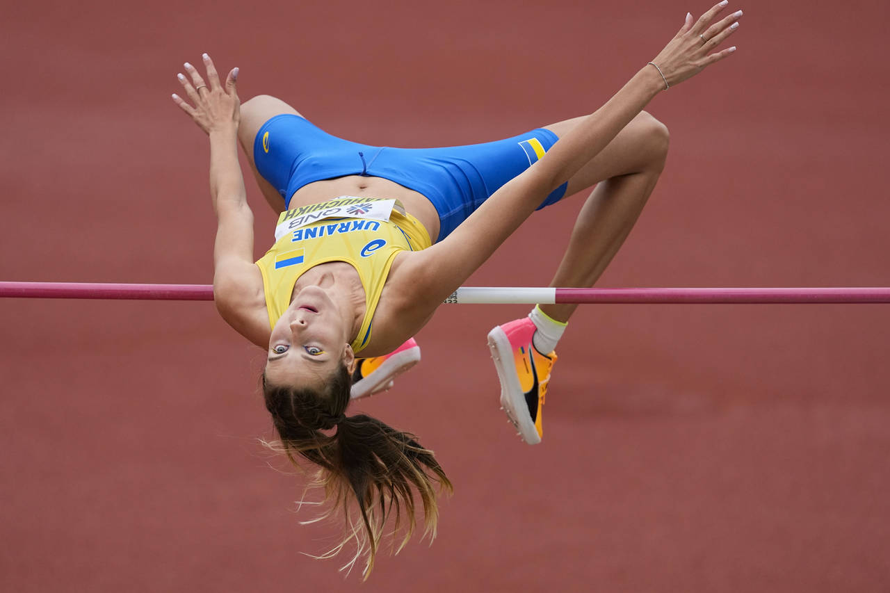 Yaroslava Mahuchikh, of Ukraine, competes during qualifying for the women's high jump at the World ...