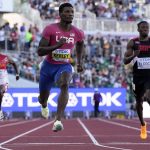 
              Fred Kerley, of the United States, wins a heat in the men's 100-meter run at the World Athletics Championships Friday, July 15, 2022, in Eugene, Ore. (AP Photo/Ashley Landis)
            