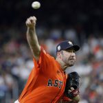 
              Houston Astros starting pitcher Justin Verlander throws to a Seattle Mariners batter during the first inning of a baseball game Friday, July 29, 2022, in Houston. (AP Photo/Michael Wyke)
            