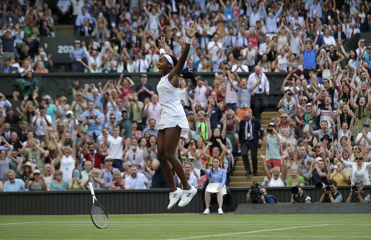 FILE - United States' Cori "Coco" Gauff celebrates after beating Slovenia's Polona Hercog in a Wome...