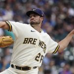 
              Milwaukee Brewers starting pitcher Aaron Ashby throws during the first inning of a baseball game against the Colorado Rockies Monday, July 25, 2022, in Milwaukee. (AP Photo/Morry Gash)
            