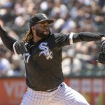 
              Chicago White Sox starting pitcher Johnny Cueto throws against the Detroit Tigers during the first inning of a baseball game Saturday, July 9, 2022, in Chicago. (AP Photo/Mark Black)
            