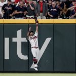 
              Atlanta Braves right fielder Eddie Rosario catches the ball for the out on Arizona Diamondbacks' Christian Walker during the ninth inning of a baseball game Saturday, July 30, 2022, in Atlanta. (AP Photo/Butch Dill)
            