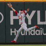 
              St. Louis Cardinals outfielder Dylan Carlson catches a fly ball by Atlanta Braves Michael Harris II in the ninth inning of a baseball game Thursday, July 7, 2022, in Atlanta. Carlson was able to throw out a runner at first base for a double play. (AP Photo/John Bazemore)
            