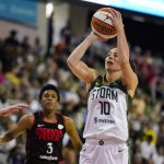 
              Seattle Storm guard Sue Bird (10) shoots in front of Indiana Fever guard Danielle Robinson (3) in the first half of a WNBA basketball game in Indianapolis, Tuesday, July 5, 2022. (AP Photo/Michael Conroy)
            