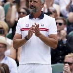 
              Former tennis player and current coach of Novak Djokovic,  Goran Ivanisevic, during day seven of the 2022 Wimbledon Tennis Championships in London, Sunday July 3, 2022. As in many sports, tennis has its share of well-known coaches. Unlike in other sports, tennis does not always allow them to coach. Indeed, at Wimbledon, Novak Djokovic can't get any sort of instructions from Goran Ivanisevic at Centre Court during the men's semifinals on Friday. ( John Walton/PA via AP)
            