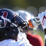 
              Houston Texans' Desmond King II takes a drink of water during an NFL football training camp practice Friday, July 29, 2022, in Houston. (AP Photo/David J. Phillip)
            