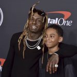 
              Lil Wayne, left, and Kameron Carter arrive at the ESPY Awards on Wednesday, July 20, 2022, at the Dolby Theatre in Los Angeles. (Photo by Jordan Strauss/Invision/AP)
            