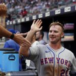 
              New York Mets' Pete Alonso (20) celebrates in the dugout after scoring on a Luis Guillorme ground ball in the third inning of a baseball game against the Atlanta Braves, Monday, July 11, 2022, in Atlanta. (AP Photo/John Bazemore)
            