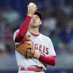 
              Los Angeles Angels starting pitcher Shohei Ohtani prepares to throw during the first inning of the team's baseball game against the Miami Marlins, Wednesday, July 6, 2022, in Miami. (AP Photo/Lynne Sladky)
            